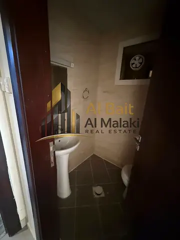 Spacious 1-Bedroom Apartment for Annual Rent in Abu Danq with Beautiful Open View, Balcony, Free Pa