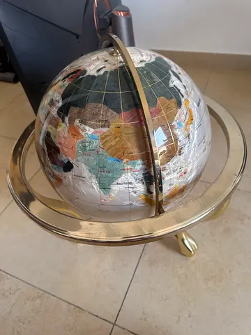 Decorative world globe on brass stand - good condition