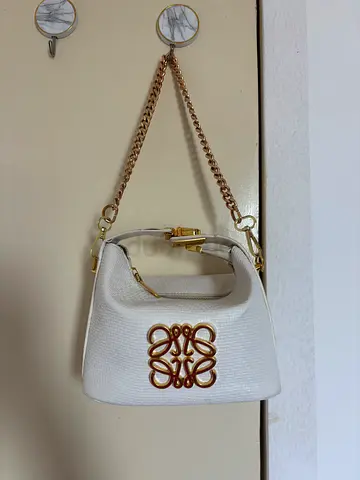 White Textured Handbag with Gold Tone Chain Strap