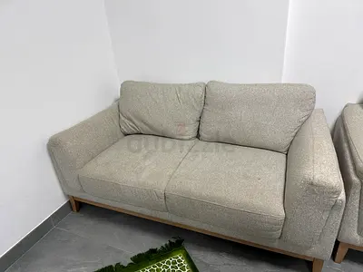 Light grey 2-seater sofa in good condition