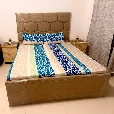 Queen-sized upholstered bed frame mattress in excellent condition With storage area