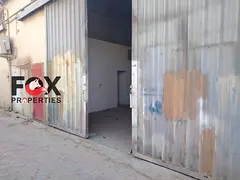 Warehouse for annual rent, 2,000 sq. ft., in Al Jurf 3. Price: 85,000 (negotiable).
