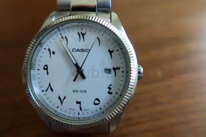 Casio stainless steel watch with Arabic numerals