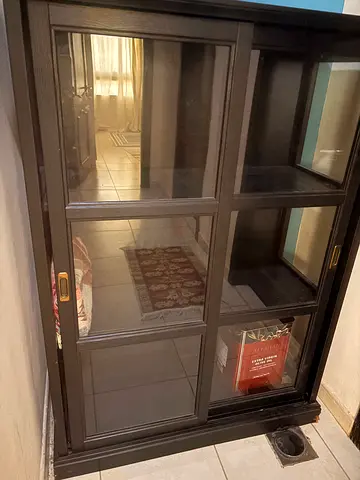 Dark wood display cabinet / glass-door storage unit