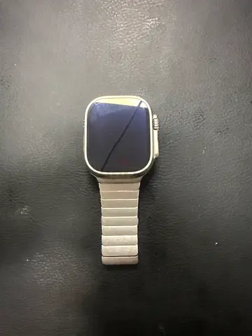 Apple Watch Ultra 2 with Orange Rubber Strap and metal strap