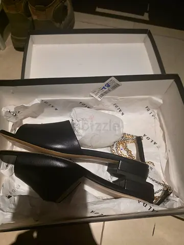 Black leather heeled mules with gold chain strap - barely worn