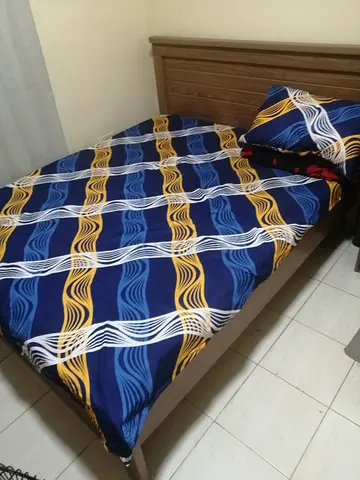 Wooden bed frame with mattress and Dresser - good condition
