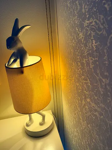 Bedside lamp with decorative rabbit holder
