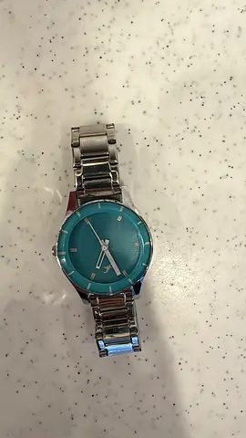 Fastrack Silver metal bracelet watch with turquoise dial - good condition