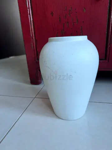 White decorative ceramic vase — simple modern design