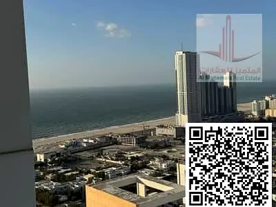 Apartment for sale: 1 bedroom, living room, 2 bathrooms, and parking. Prime location at Ajman One Towers, Phase 2.