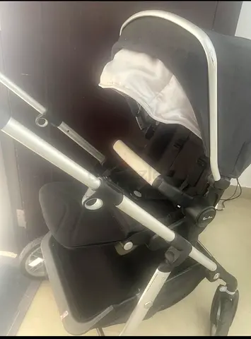 Silver frame black stroller - single/standard reversible seat, good condition