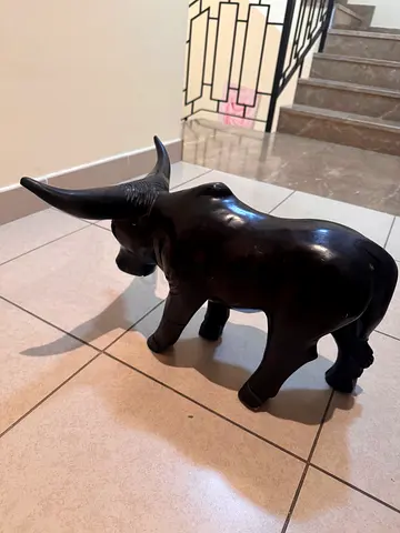 Bull and alligator ebony wood statues