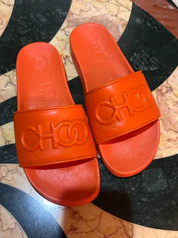 Orange slide sandals (women's) - Jimmy Choo. New