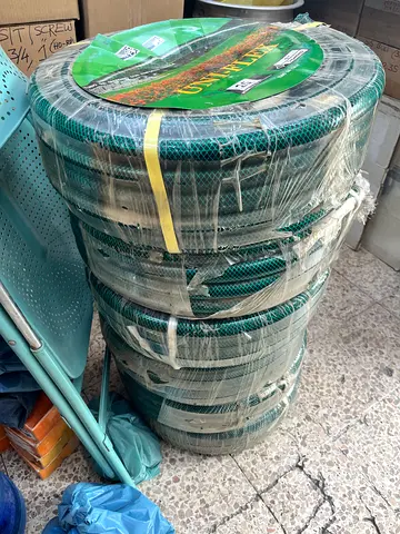 Coiled Green Garden Hose 1” X 25 metre