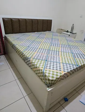 King size bed with headboard and strong wood and recently purchased mattress