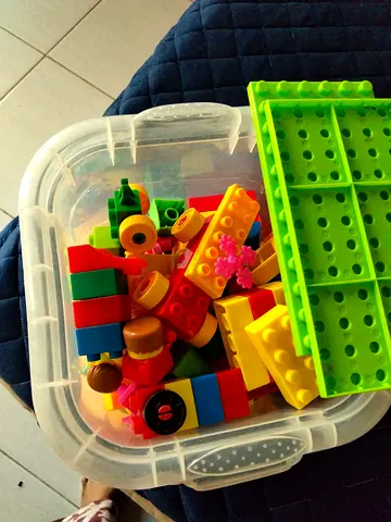 Container of mixed large plastic building blocks with base plates - used