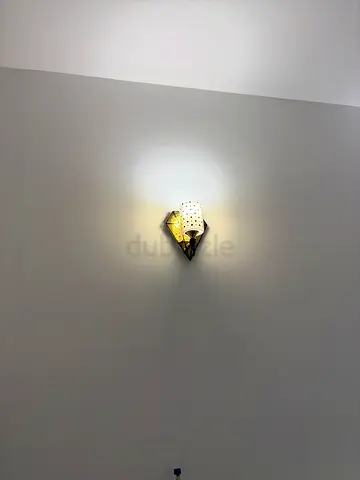 Wall-mounted decorative sconce light - single unit, working condition