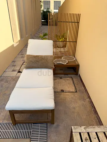 Outdoor IKEA wooden lounge chair w/ cushion, privacy screen and outdoor table  - good condition.