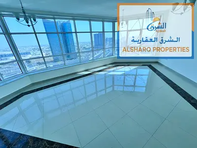 Spacious 2-Bedroom Apartment with Living Room for Annual Rent in Mushairif Ajman with Balcony, Panoramic Glass and Central AC