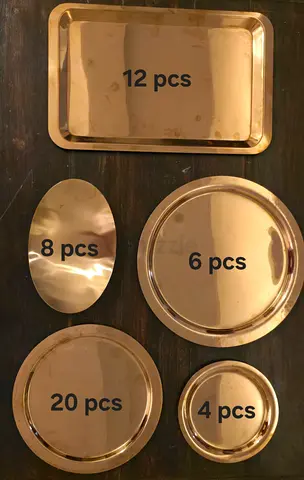 Set of steel serving trays and plates with brass finish- mixed sizes (50 pieces)