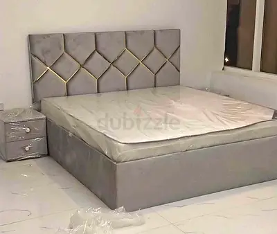 Brand New Grey upholstered double bed with padded headboard and storage base