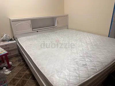 Queen bed frame with headboard storage and mattress - used