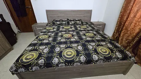Homw centre bed frame with two matching bedside tables dressing table and cupboard for sale