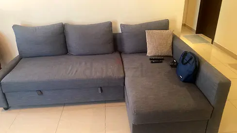 Grey L-shaped Convertible Sofa with Storage - Good Condition