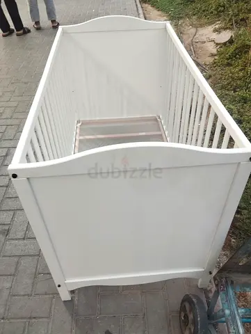 White wooden baby crib - good used condition