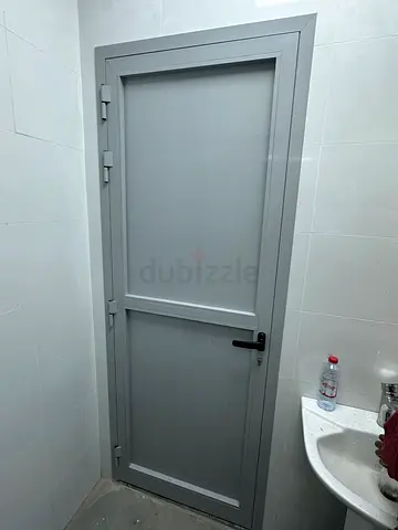 Grey metal bathroom/utility door with lock - New