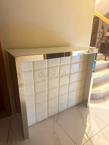 Modern stainless steel and white leather bar from Marina Home!