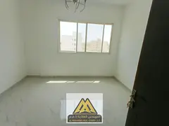 Brand-new 2BR in Al Alia, balcony, 2 baths, central AC, free maintenance, AED 36,007 in 4 cheques.