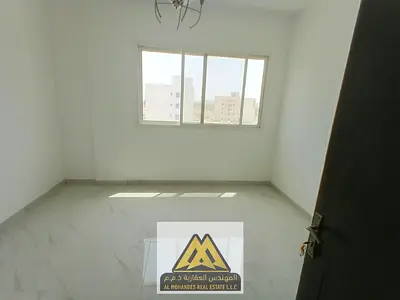 Brand-new 2BR in Al Alia, balcony, 2 baths, central AC, free maintenance, AED 36,007 in 4 cheques.
