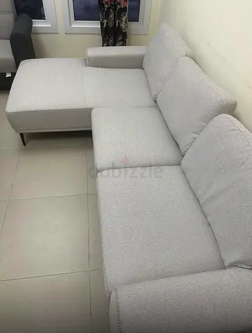 Light grey L-shaped 3-seater sofa with chaise - good condition