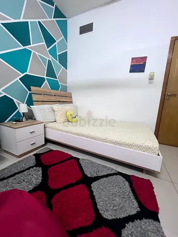 Single bed with mattress, one bedside table and Study Table