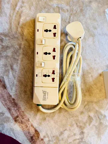Power strip extension with individual switches and UK plug