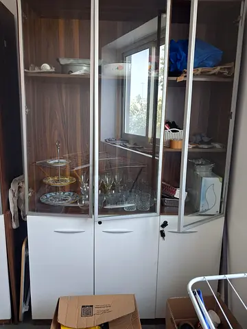 White display cabinets with glass doors
