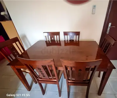 Wooden Dining table with 6 chairs