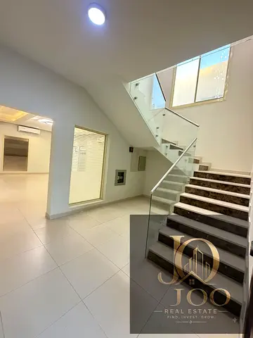Prime Location | 5 Master Bedrooms | Spacious Majlis & Two Living Halls | Private Yard | Maid’s Room | Suitable for Residential or Commercial Use