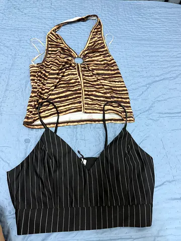 Two women's crop tops — striped zebra halter and black pinstripe bralette, size S/M
