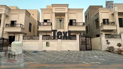 Villa for sale in Al Helio, Ajman, featuring 6 master bedrooms, a majlis, and a living room. Freeho