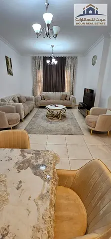 Furnished one-bedroom apartment with a living room in Al Nahda, Sharjah.