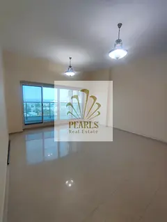A spacious, luxury apartment available for annual rent in Al Rumaila 1, situated in the first row al