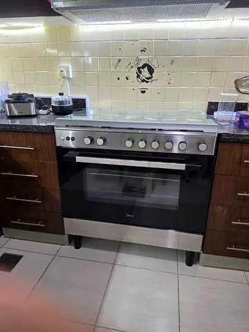 Gas Cooker Stainless Steel Freestanding Gas with Oven Midea brand - Very Good Condition