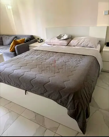 Ikea king size bed with mattress and storage drawers