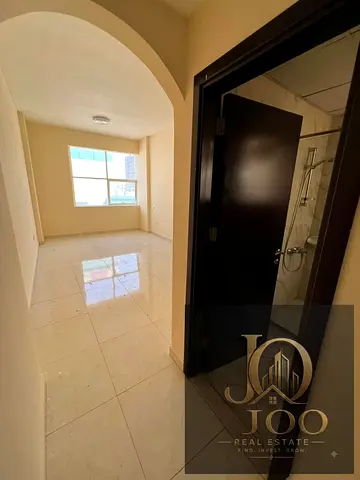 One-bedroom apartment with living room (master bedroom) | Spacious layout | Quiet building | Secure access | Prime location in Al Jurf 2