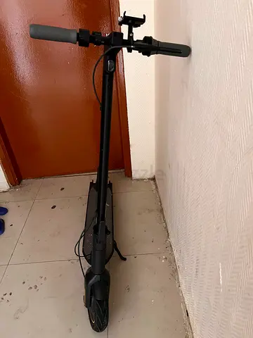Black electric scooter in good working condition