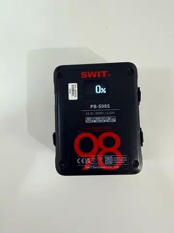 a SWIT PB-S98S 14.4V 98Wh Multi-Sockets Square Digital Battery Pack (V-Mount). It features a compact