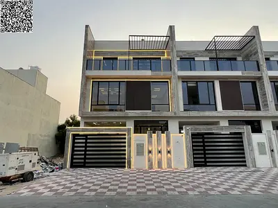 Luxury modern-design townhouse in Al Helio 2, Ajman – price includes registration and title transfer fees.